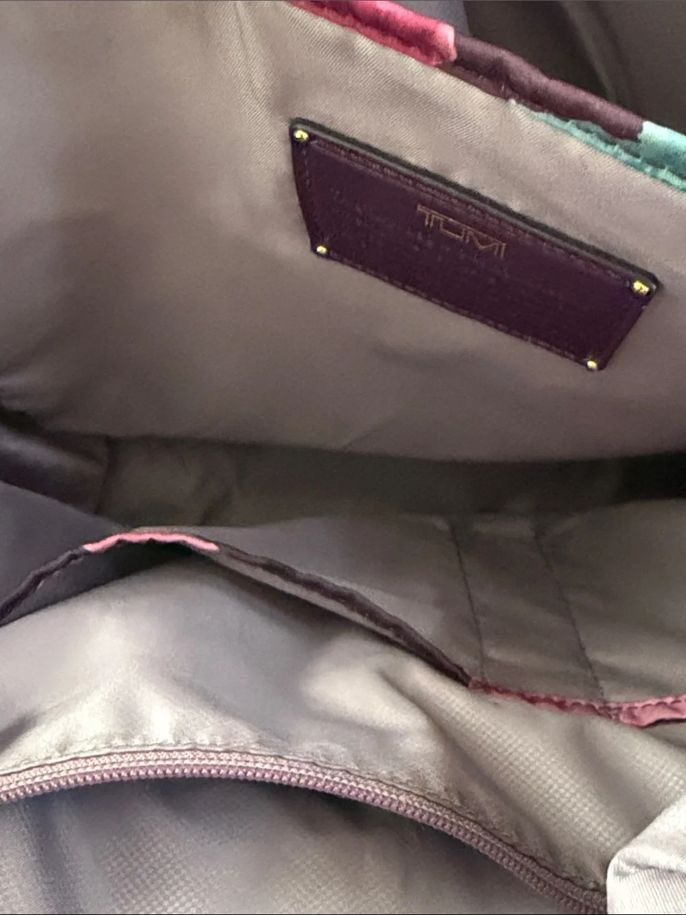 Tumi Men's Burgundy Nylon Backpack with Gold Hardware